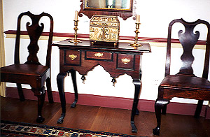 Dressing table on cabriole legs with ankleted Spanish feet, between two chairs from Joseph Richardson