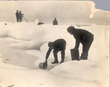 Crew of the Nautilus conducting experiments on ice