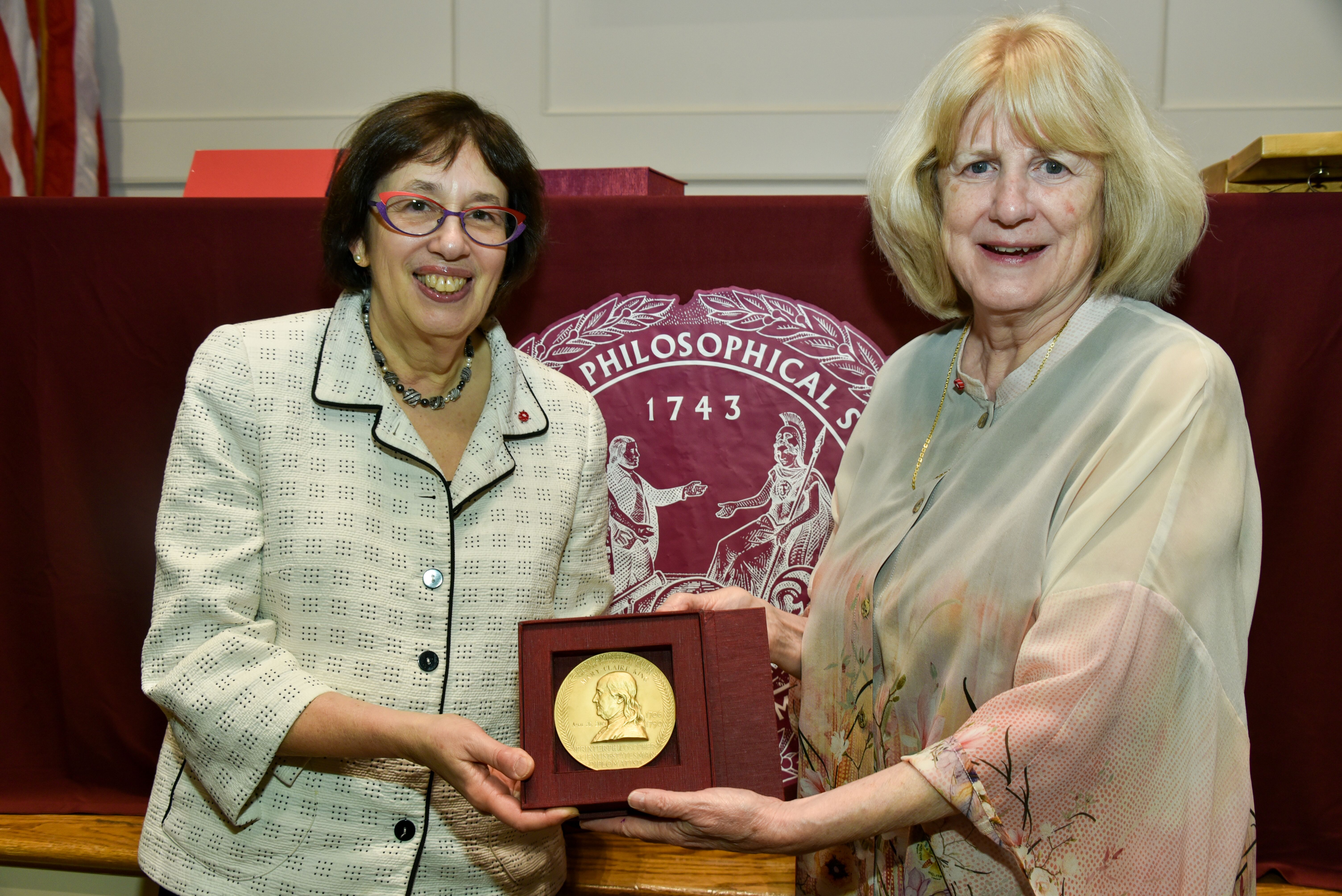 Mary-Claire King and Linda Greenhouse hold Franklin Medal