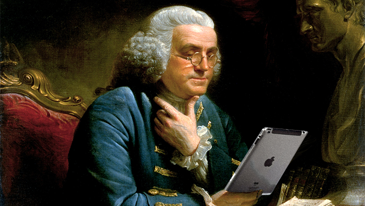 Franklin reading an iPad