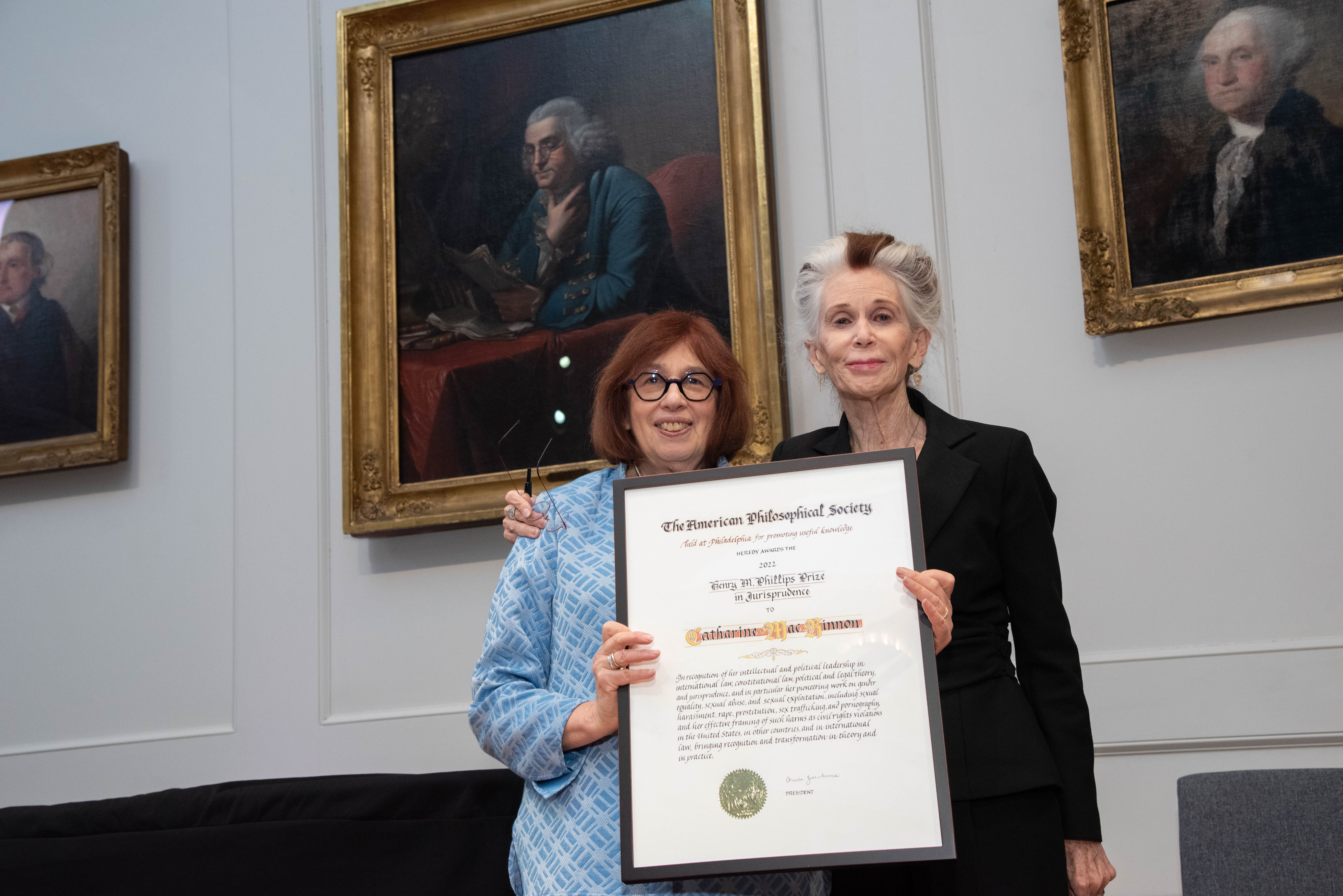 Catharine MacKinnon receiving the Phillips Prize Certificate
