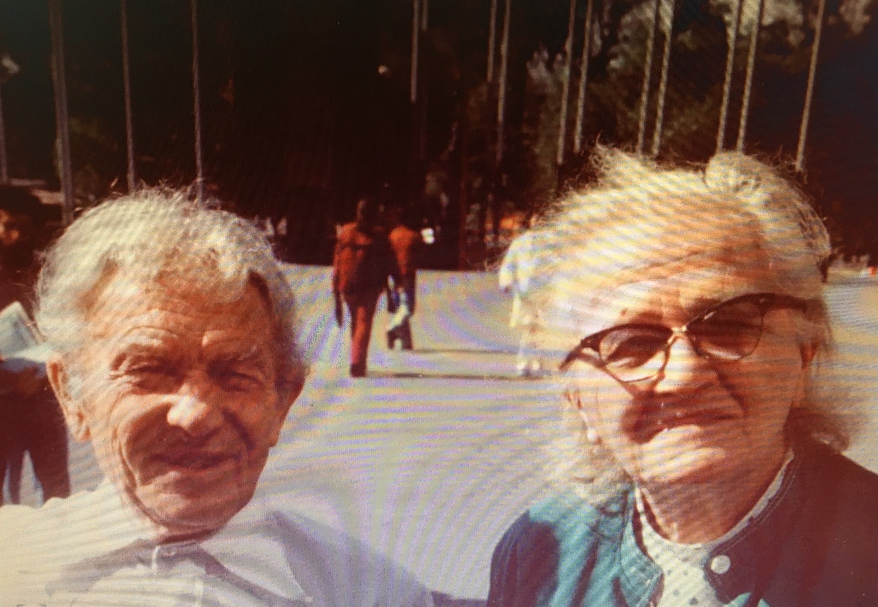 color photo of faces of Sergei (left) and Cecelia (right)