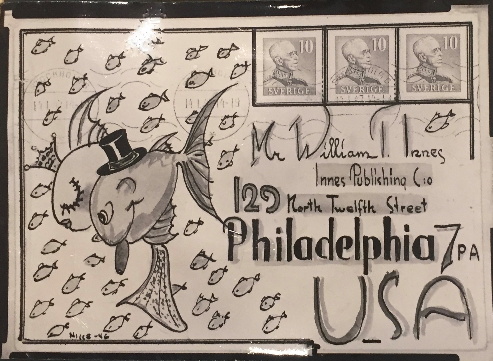 photo of letter with illustrated fish, black and white