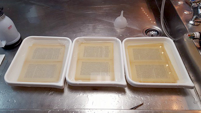 Paper in three stages of water bath