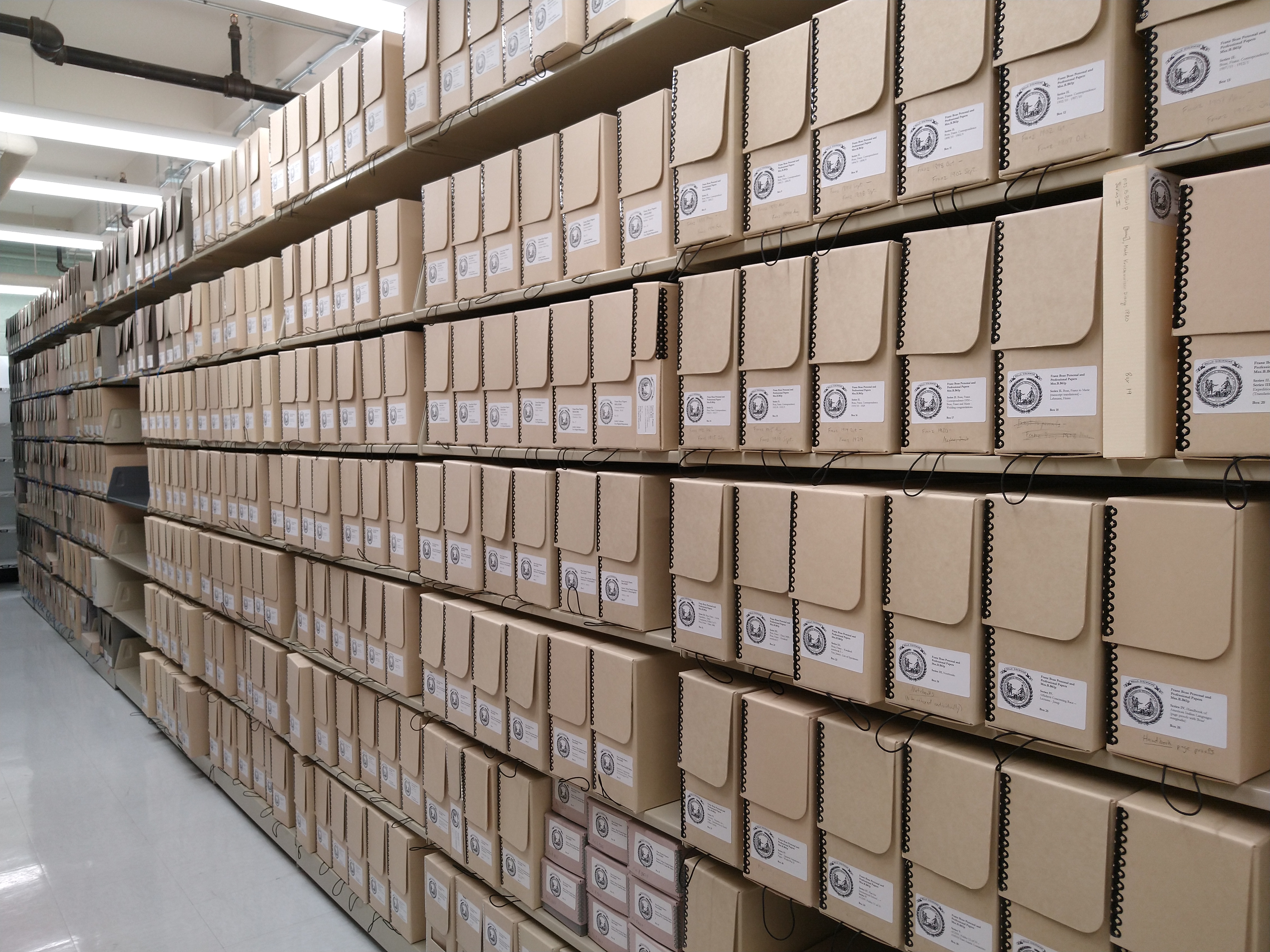 photo of long shelf of boxes of manuscript material