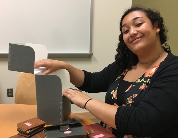 woman opening archival box