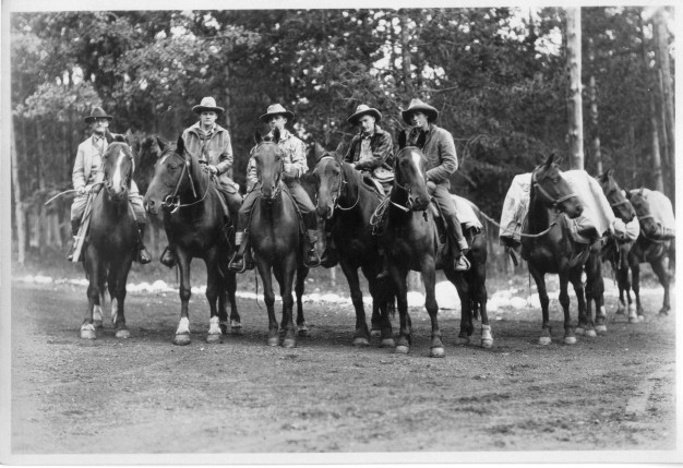 five men on horseback