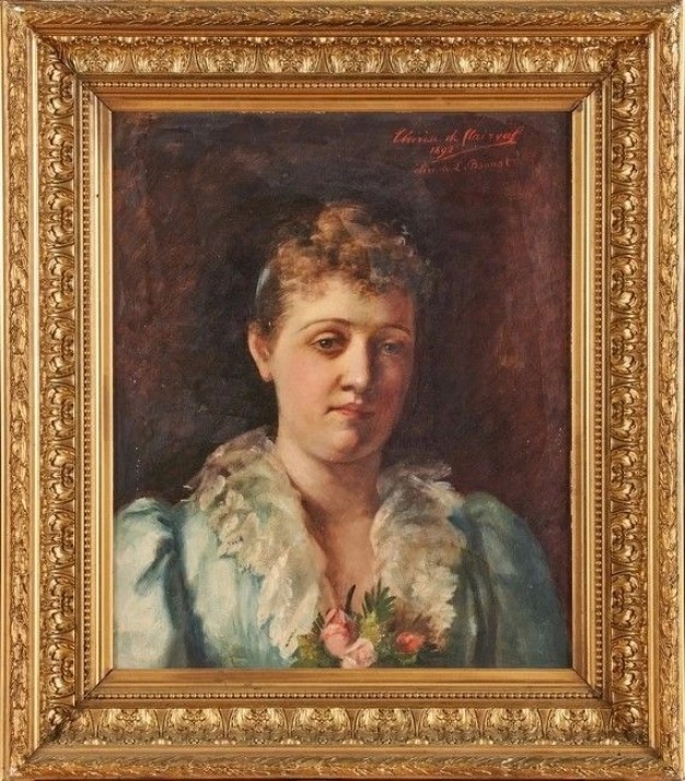 painted portrait of woman in gold frame
