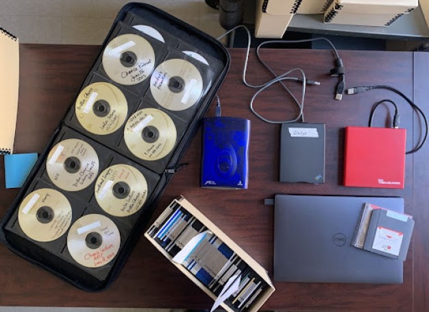 photo of different types of digital media on desk