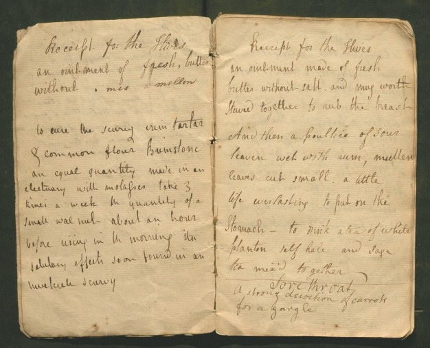 A handwritten note in a weathered paper notebook.