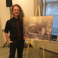 young man with poster