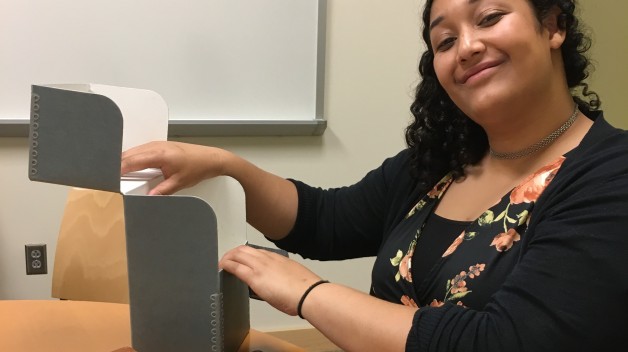 woman opening archival box