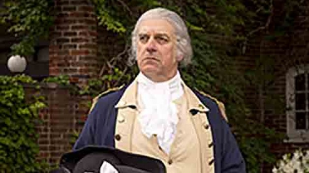 George Washington standing in a garden