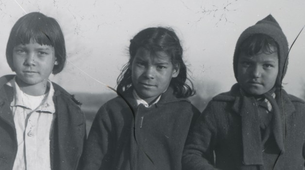 three children in black and white photo