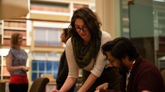 Woman helping a researcher in the Reading Room