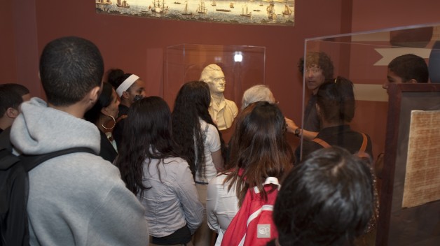 Museum guide giving an exhibition tour