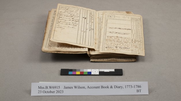 photo of open book before conservation treatment