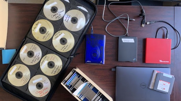 photo of different types of digital media on desk