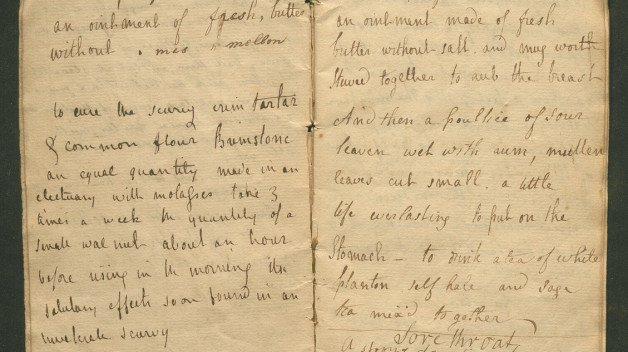 A handwritten note in a weathered paper notebook.