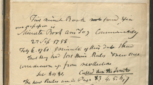 Handwritten title page in an aged journal