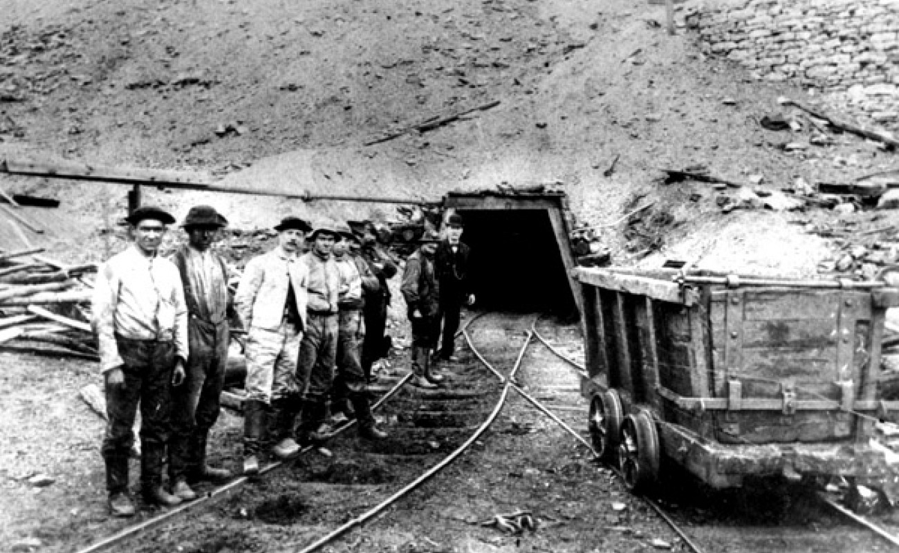 19th-century coal miners outside of mine