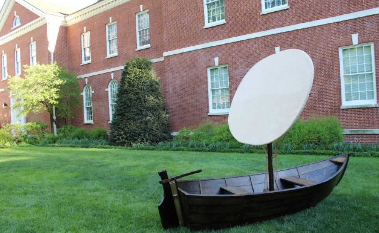 A picture of an art installation of a boat in the Jefferson Garden 
