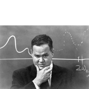 Man standing against chalkboard