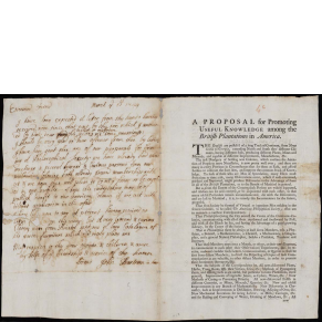 printed document with signs of age and manuscript letter on left hand folio