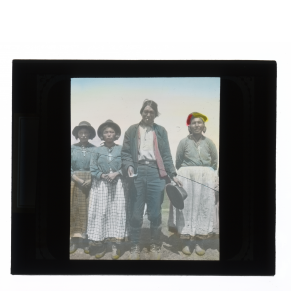 Hand-colored glass lantern slide portrait of an Innu family.