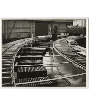 black and white photo of man walking on Bevatron