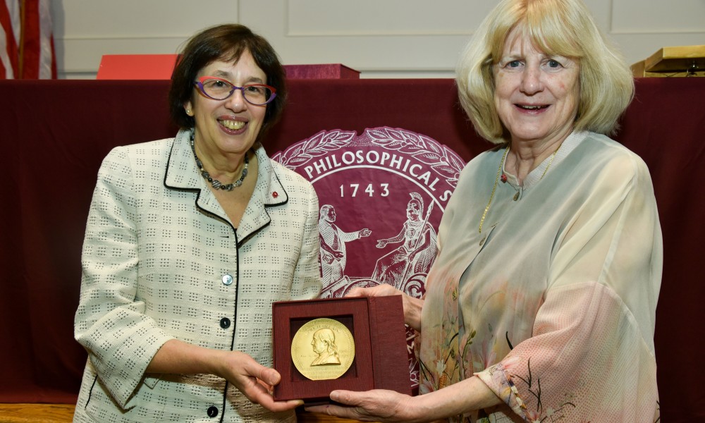 Mary-Claire King and Linda Greenhouse hold Franklin Medal