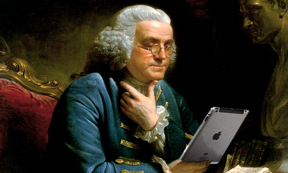 Franklin reading an iPad