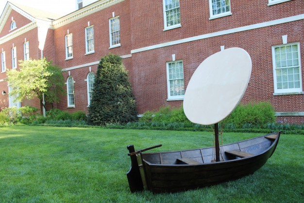 A picture of an art installation of a boat in the Jefferson Garden 