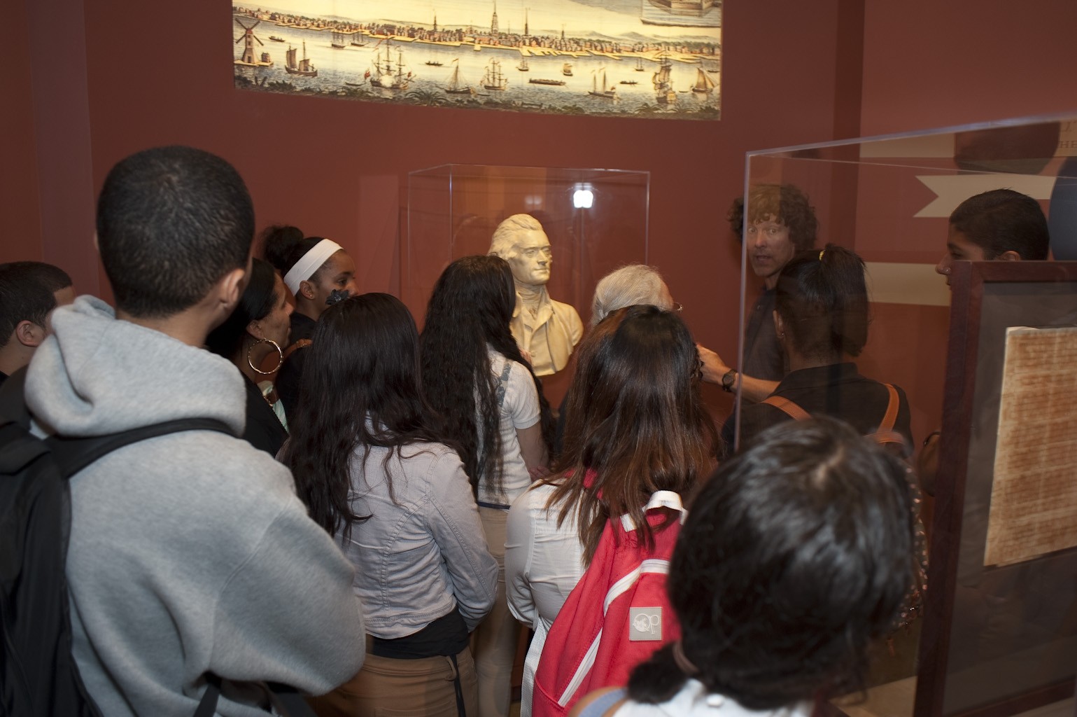 Museum guide giving an exhibition tour
