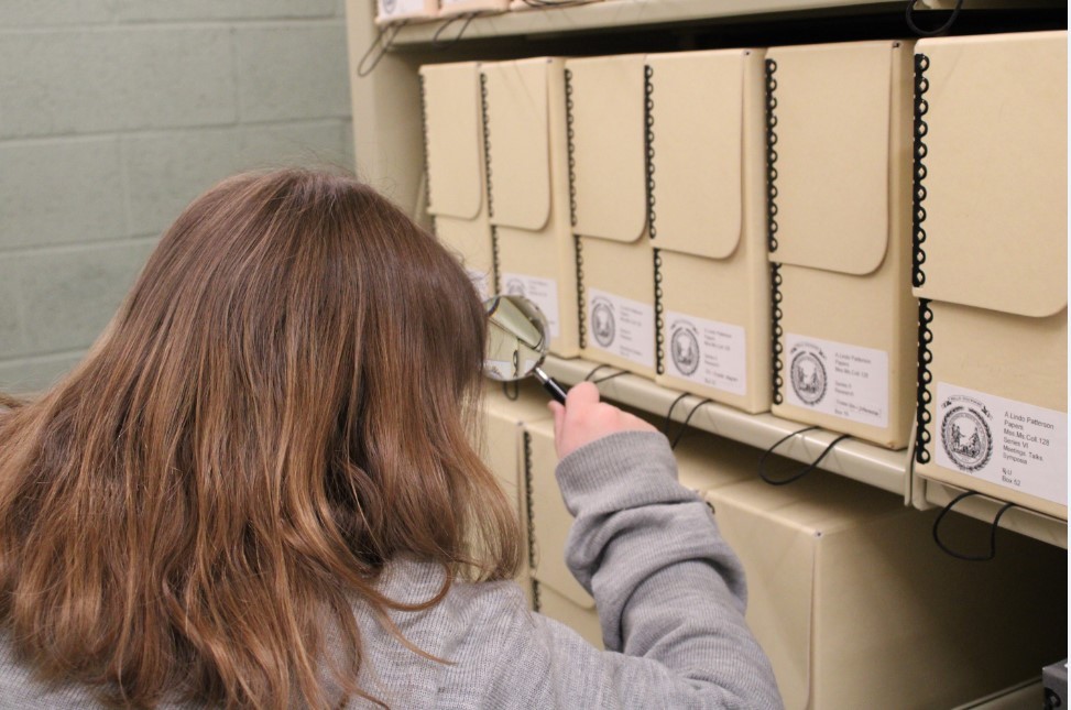 A Picture of Museum Education Coordinator Ali Rospond in the Archive