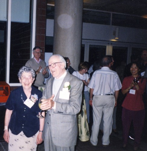 two elderly bespectacled individuals. One male, one female. 