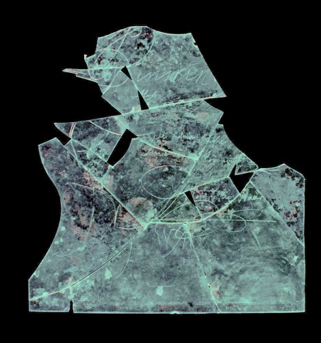 Glass windowpane, graffitied 